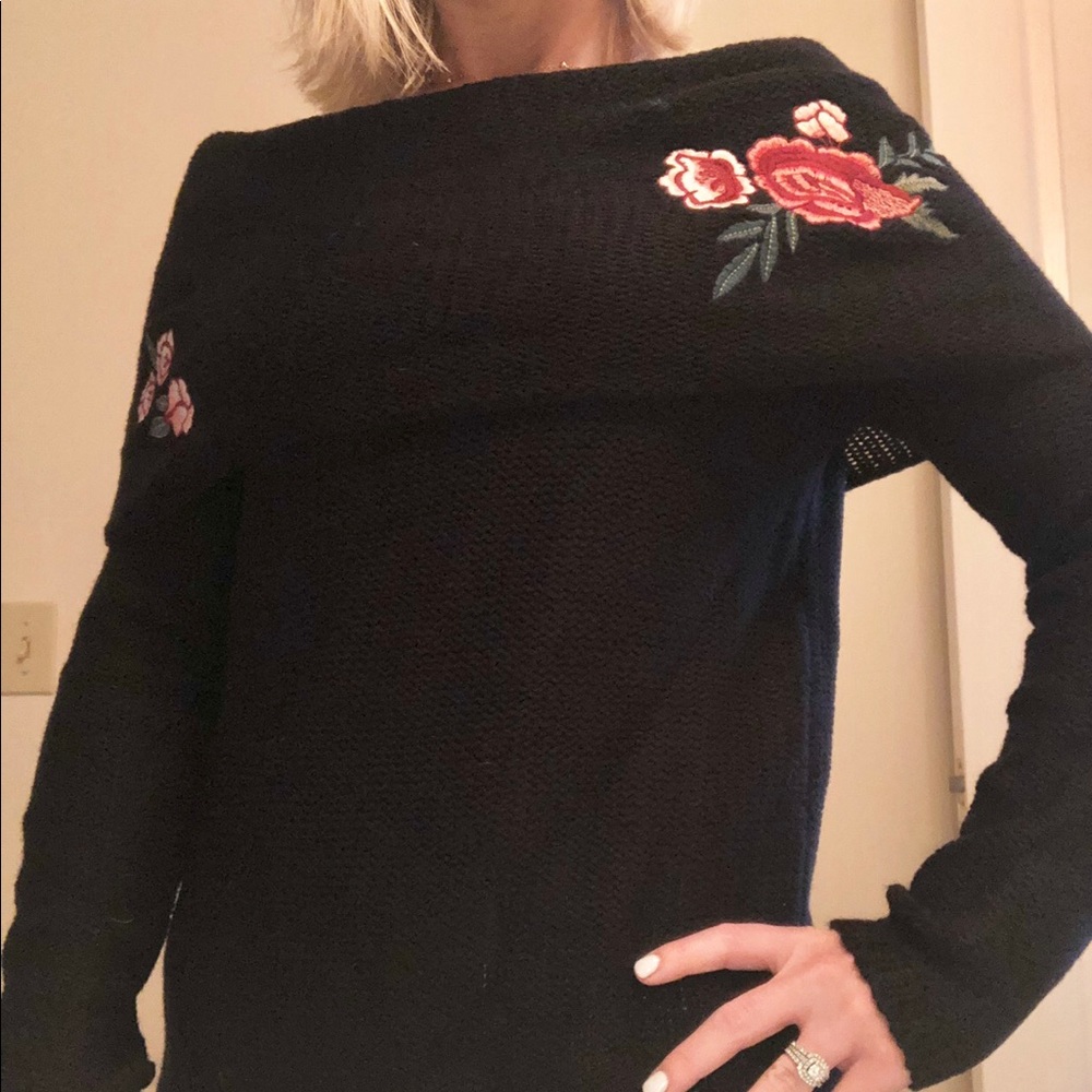 Cute over the shoulder black sweater.